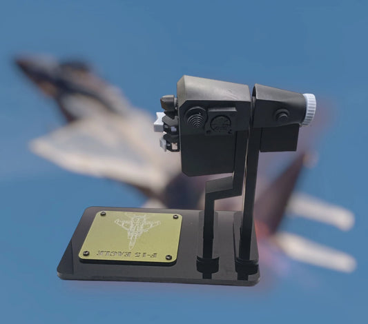 Front view of F-15 throttle replica with dual levers and switches.