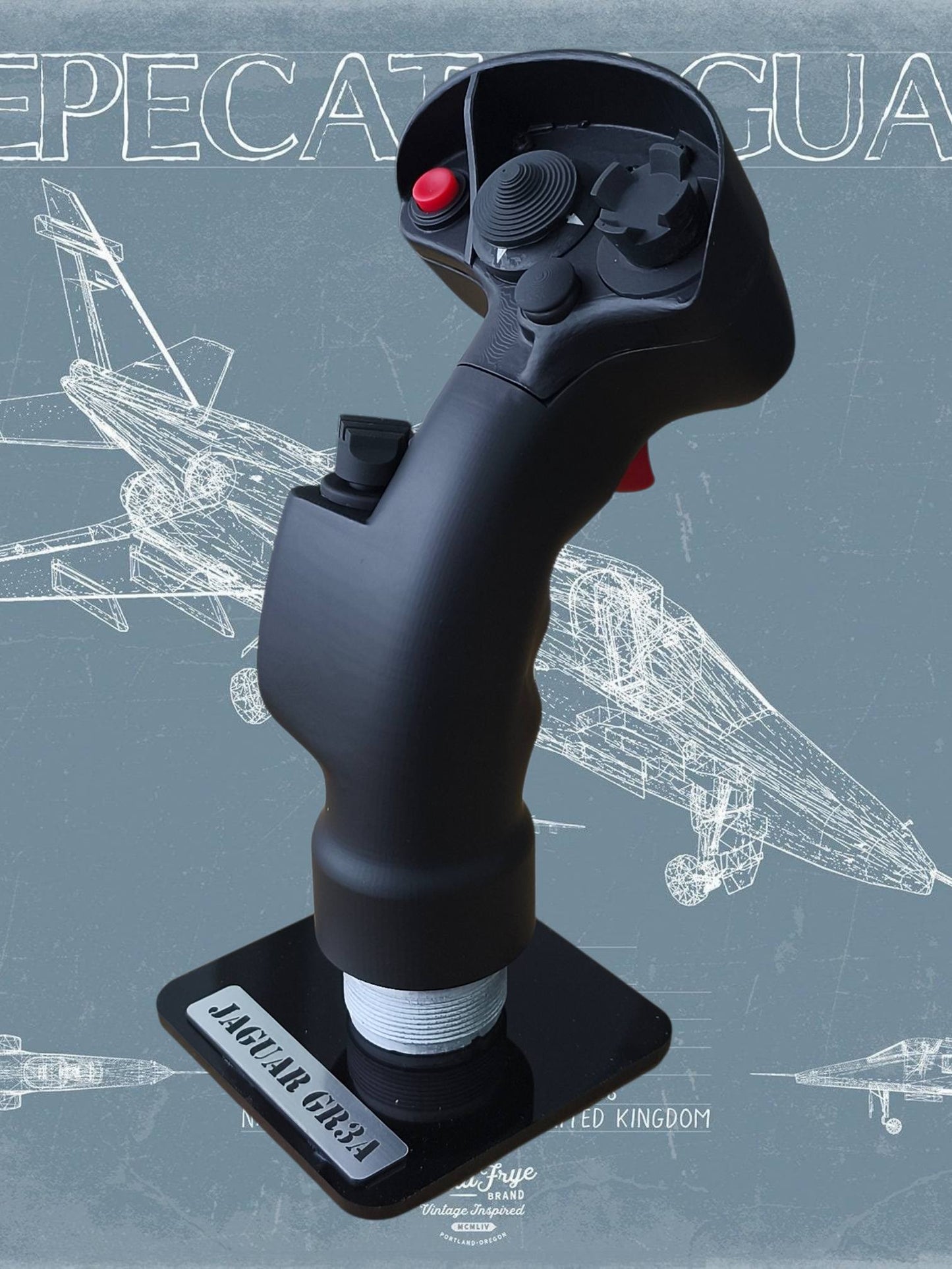 Black joystick controller with red buttons on a gray background with airplane illustrations