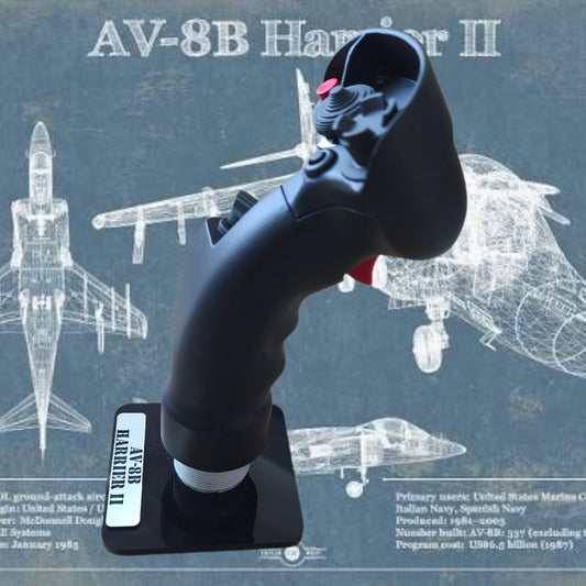 Black joystick with red button on a blue background featuring technical drawings of an aircraft.