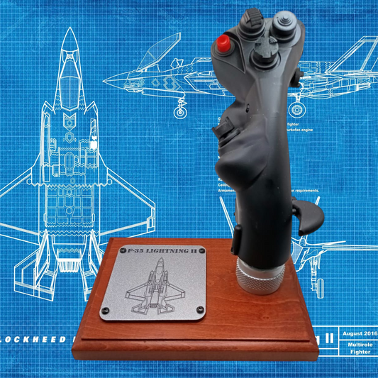 Front view of F-35 Lightning II stick replica on wood base.