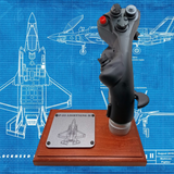 Front view of F-35 Lightning II stick replica on wood base.