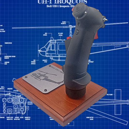 Right angle of UH-1 cyclic grip replica mounted on wood base